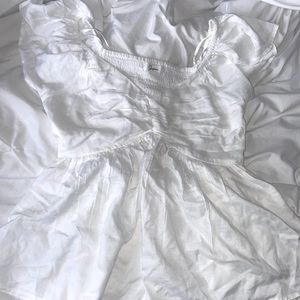 White flowy top